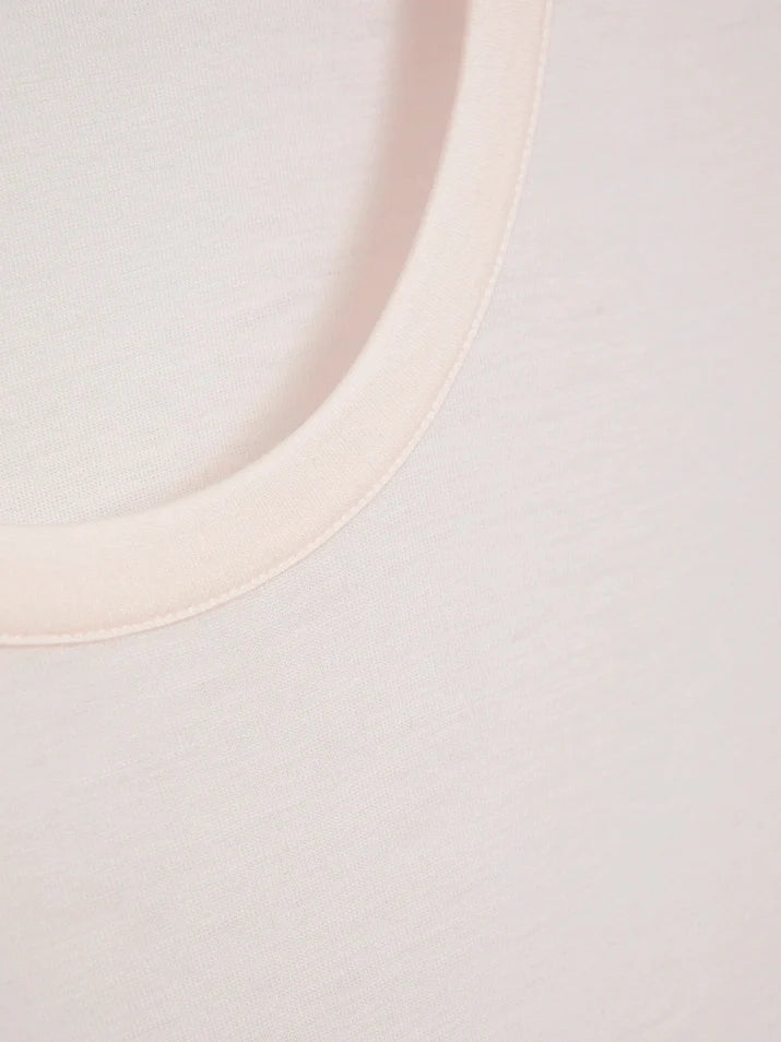 Close-up of the bound neckline in Cream Pink