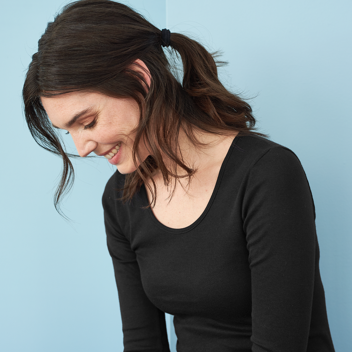 Women's organic cotton thermal long sleeve t-shirt in Black, close-up of the deep round neck