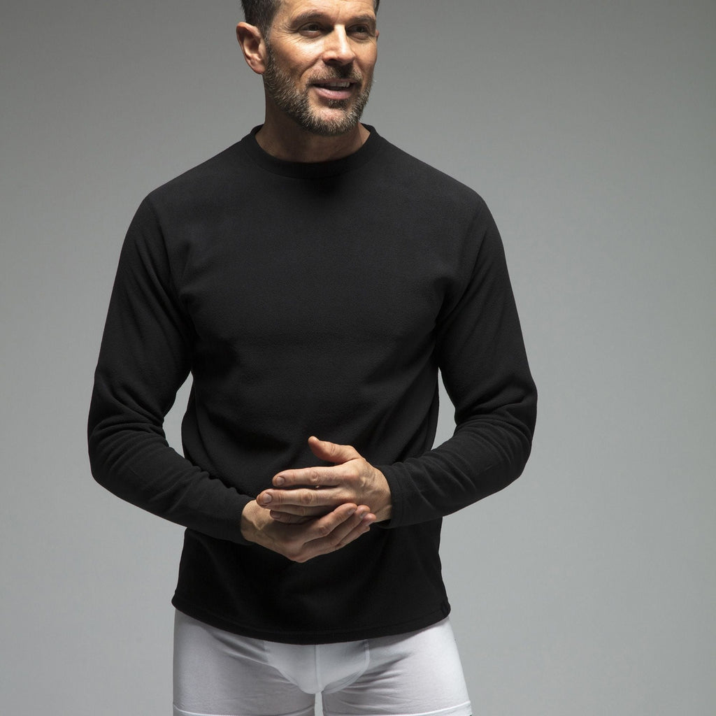 Men's fleece-lined thermal long sleeve top in Black, close-up worn by a model, front view