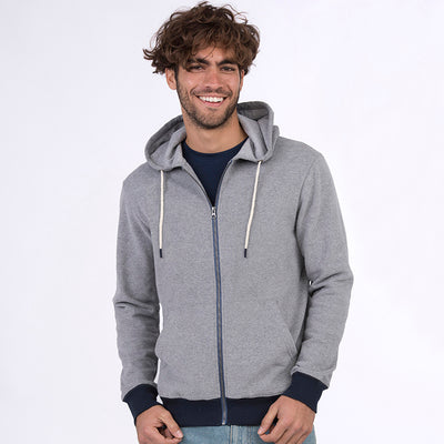 Man wearing the recycled contrast zip hoodie in Heather Grey/ Navy, front view