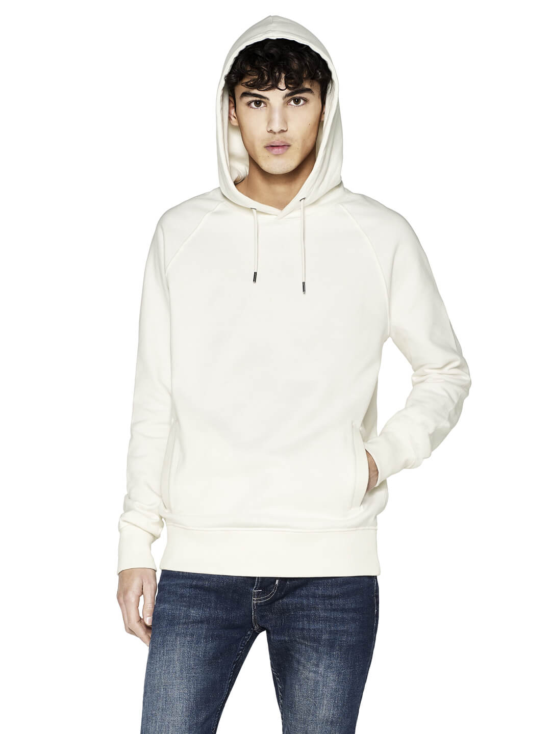 Unisex heavy organic cotton raglan hoodie in White Mist, worn with the hood up