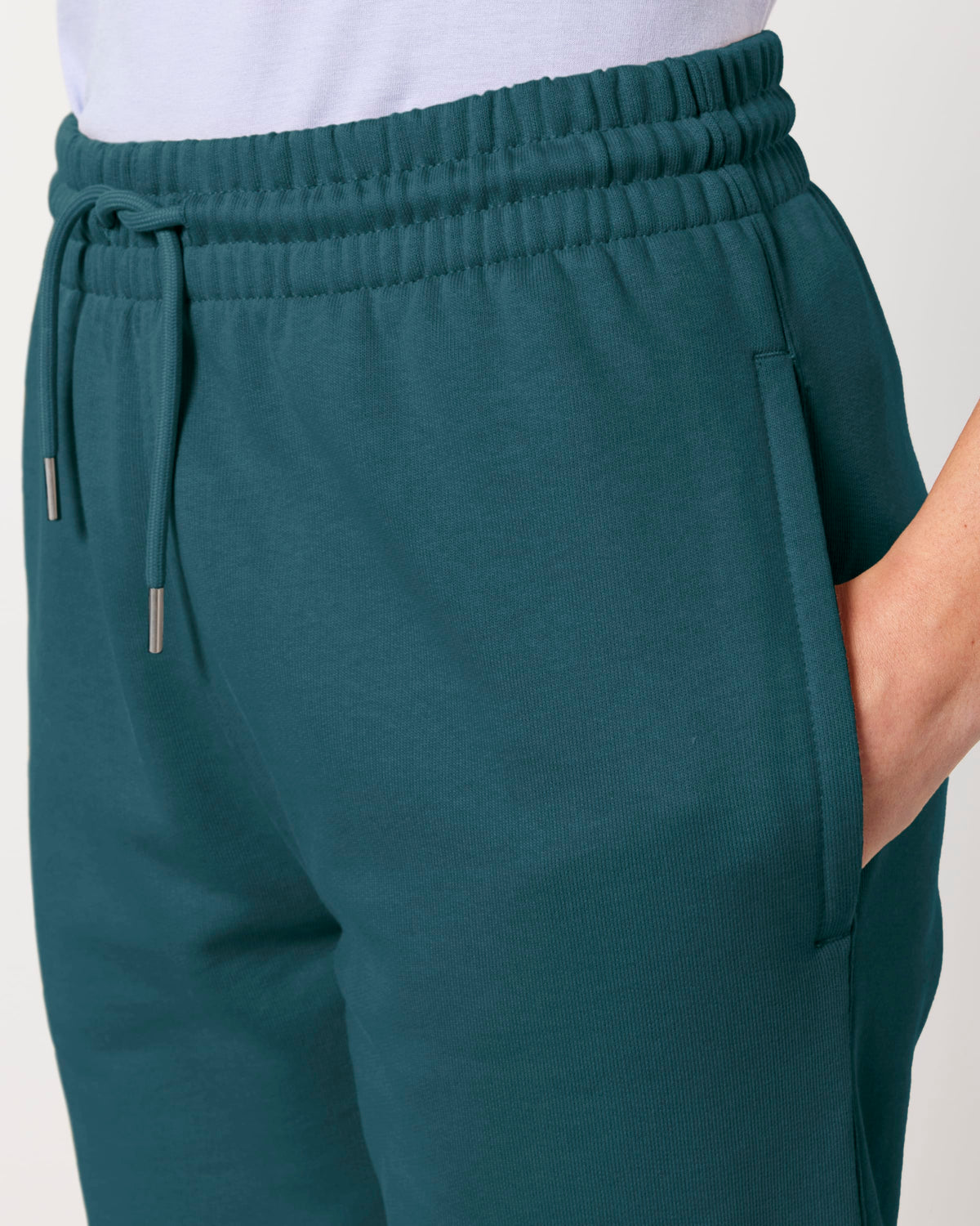 Close-up of the waistband, drawstring and side pocket on unisex organic cotton sweatpants in Stargazer