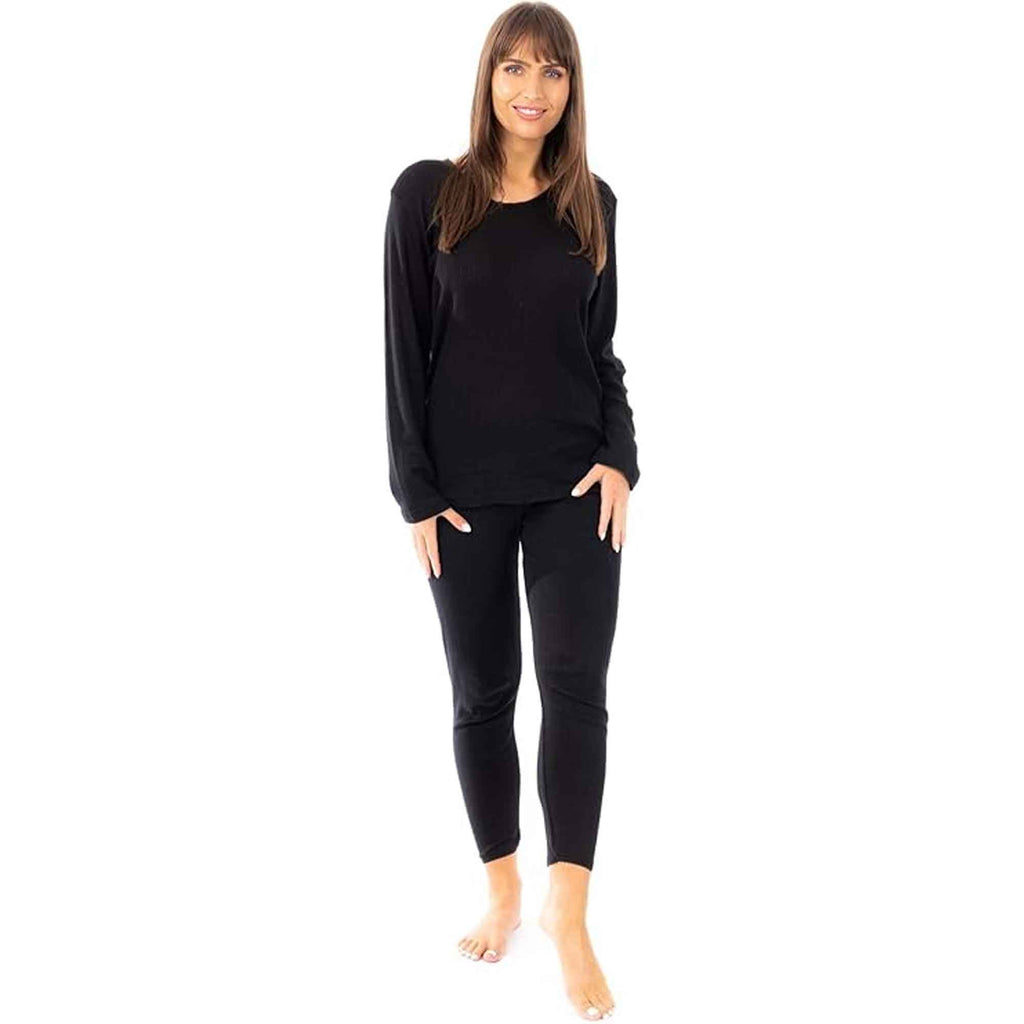 Women's cotton-rich thermal top and long johns set in BLACK, worn by a model, front view